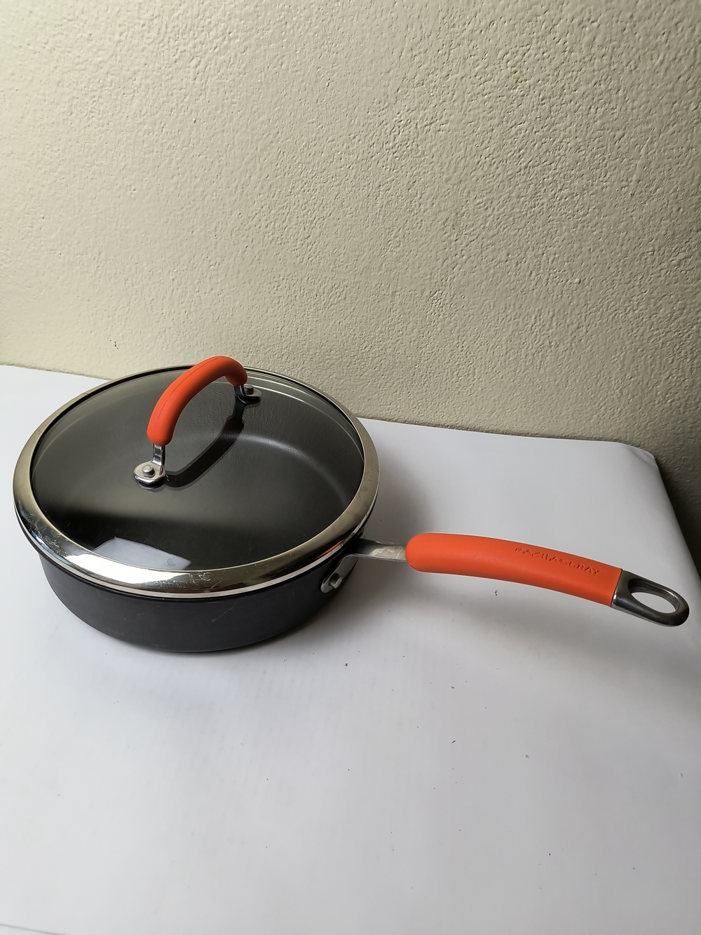 Rachael Ray 3QR/2.8L Black Sauté Pan with Orange Silicone Handle and Lid Grip